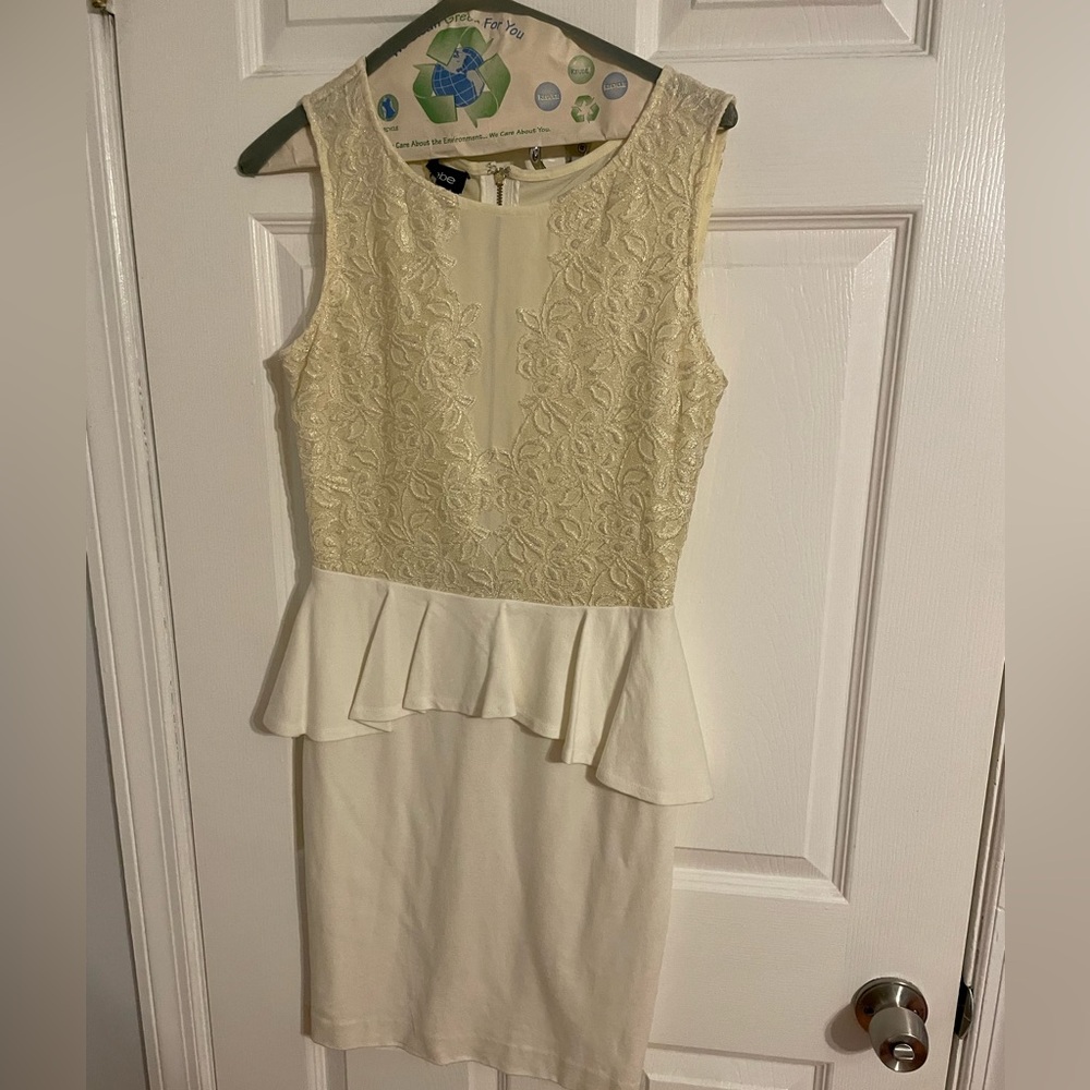 Gorgeous off white Bebe lace peplum mini dress